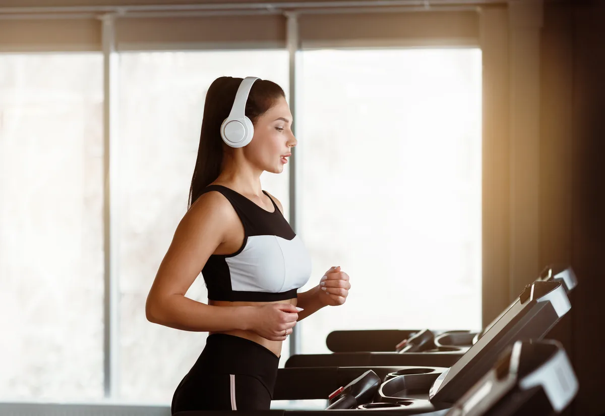 Woman listening while exercising
